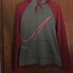 Gray Nike sweatshirt with pink sleeves